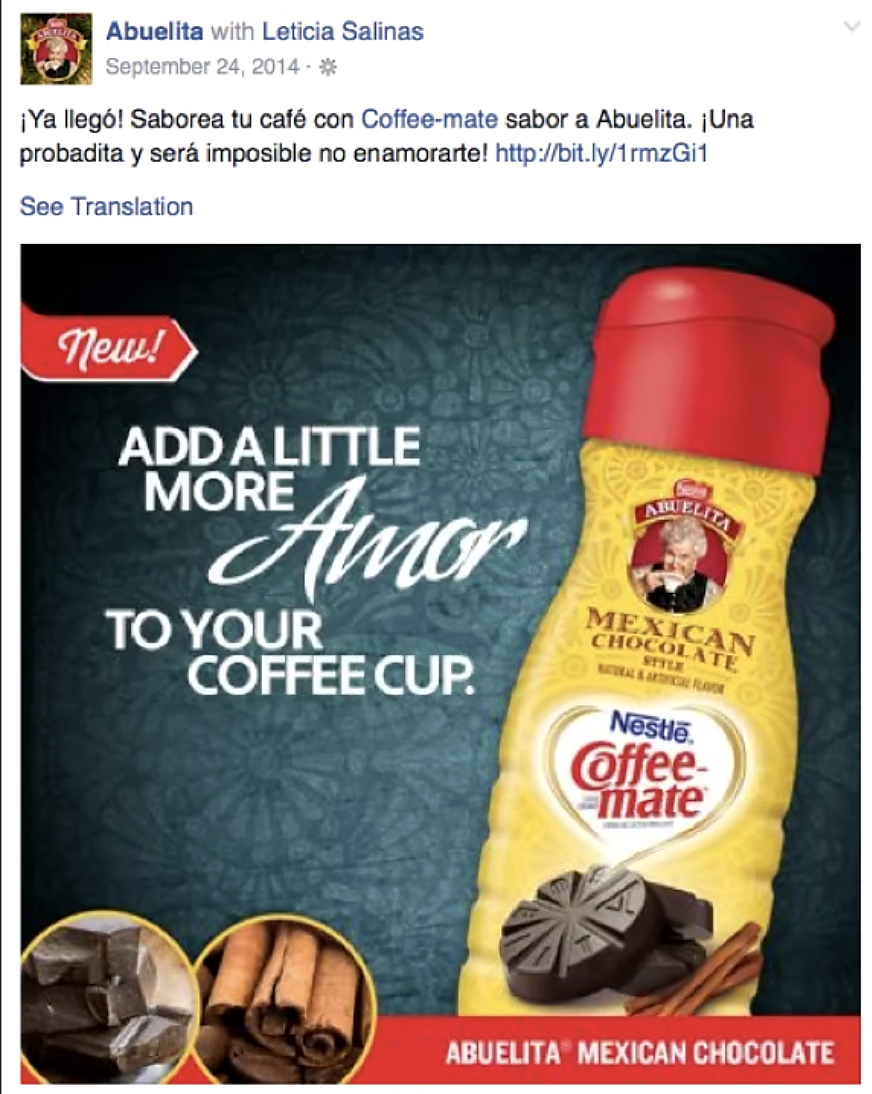Abuelita post on Facebook reading "¡Ya llegó! Saborea tu café con Coffee-mate sabor a Abuelita" above an advertisement on a dark green patterned background showing a bottle of Coffee-mate Mexican Chocolate Style creamer with the line "Add a little more Amor to your coffee cup."