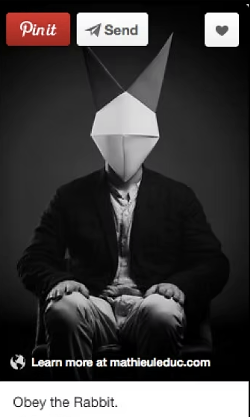 Playboy pin on Pinterest showing a black-and-white photo of a suited figure wearing a geometric rabbit mask, captioned "Obey the Rabbit."
